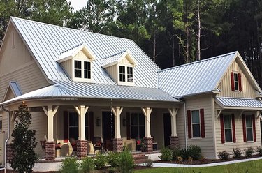 A galvanized steel roof on a farmhouse-style home