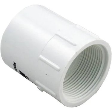 A white plumbing adapter