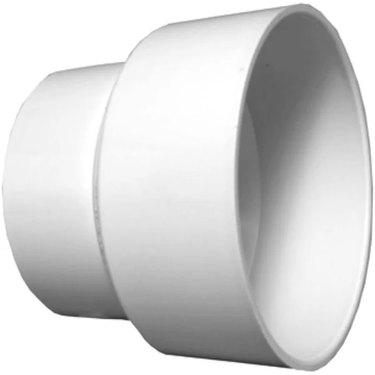 A white plumbing reducer
