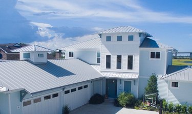 A large house with an aluminum metal roof