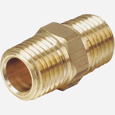 A brass plumbing nipple