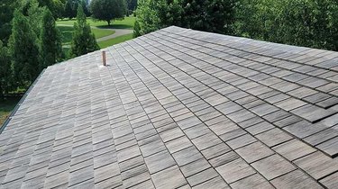 A synthetic wood shake roof