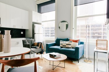 small apartment decorating ideas with teal couch