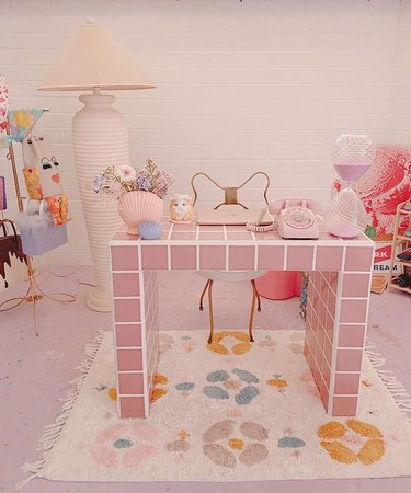desk area with pink tiled desk