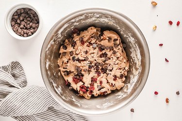 Cookie dough with chocolate chips, walnuts, and dried cranberries
