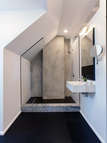 monochromatic bathroom with white, black, and gray