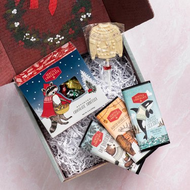 Gift box with three chocolate bars and one lollipop from Seattle Chocolate Company