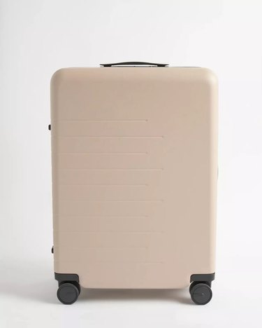 tan suitcase