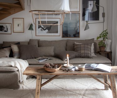 Mys/Hygge living room in neutral grays, browns and whites and cozy textures and accents