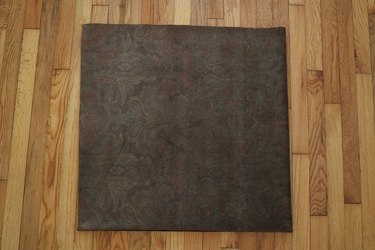 Brown velvet fabric folded in fourths