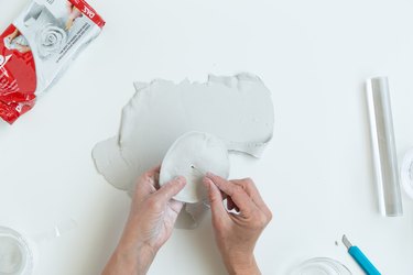 Poking a hole in air-dry clay