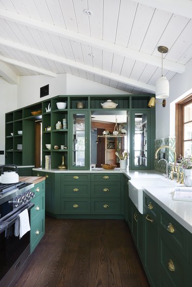 Kitchen with green cabinets