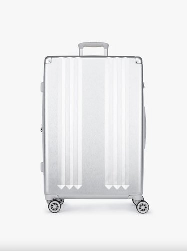 calpak ambeur large luggage in silver