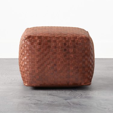 woven brown leather pouf