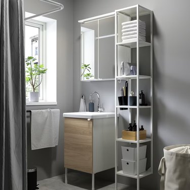 IKEA white bathroom vanity with oak effect with storage
