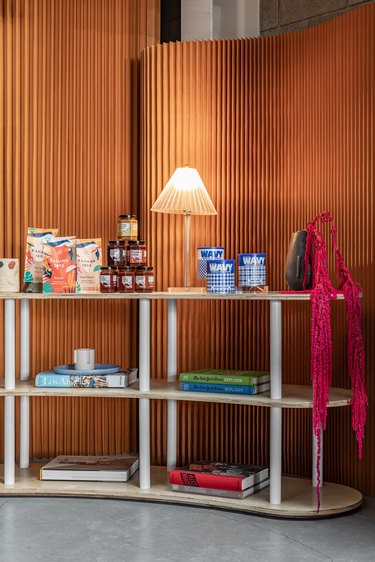 Black Spaces iteration of Hunker House showroom featuring products on shelving