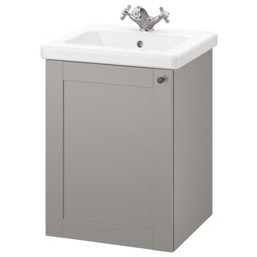 two-tone white and gray IKEA bathroom vanity with Runskär faucet