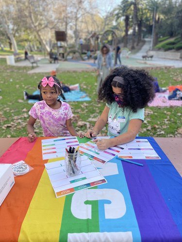 Two guests at Queer Family Picnic.