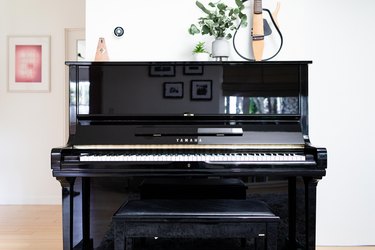 black piano in family area of home