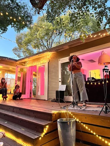 Sasha Jones at the queer poetry event, Readings at Sunset