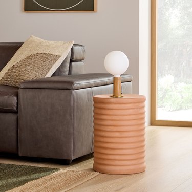 textured side table with midcentury modern lamp