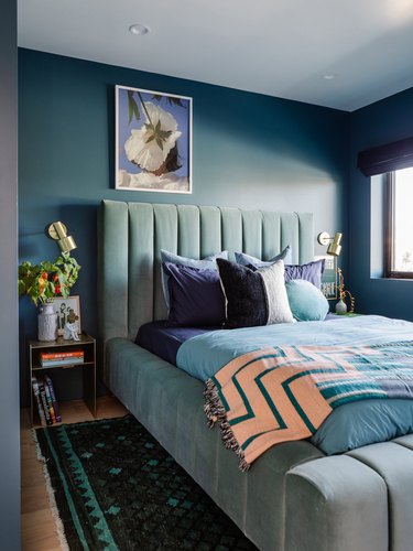 blue bedroom with teal bedframe
