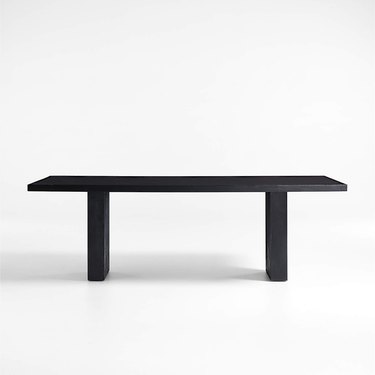 black thick-leg rectangular dining table