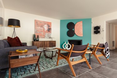 living room with turquoise accent wall