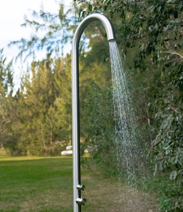 Stainless steel modern outdoor shower.