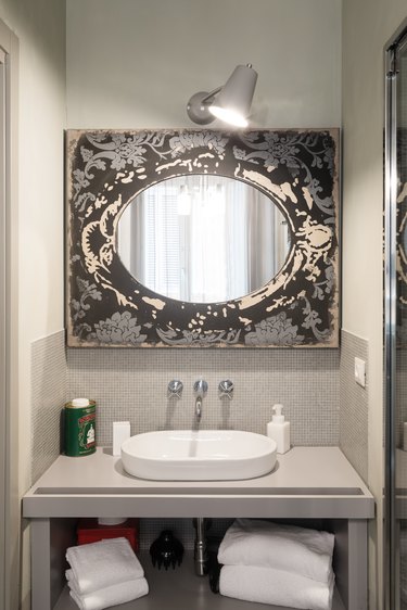 small bathroom vanity ideas with elaborate mirror