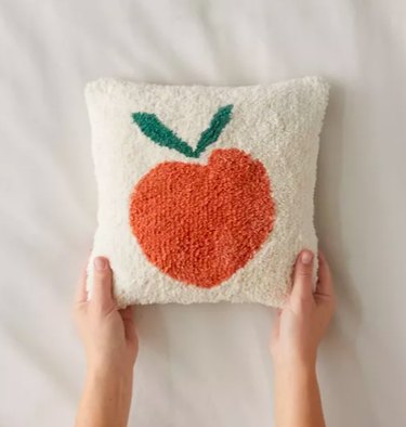 Urban Outfitters Peaches Tufted Mini Throw Pillow, $29