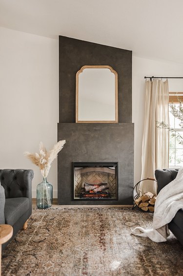 cream living room with slate gray fireplace