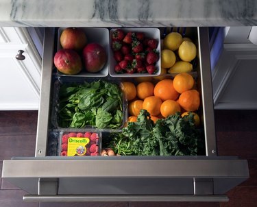 Refrigerator drawer with fruit and vegetables.