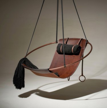 Leather swinging chair.