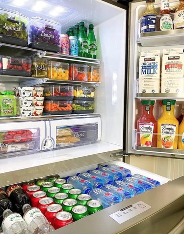 Food and drinks organized inside a refrigerator.