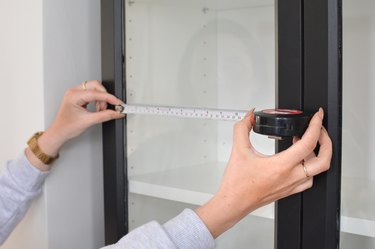 Measuring glass panels with measuring tape