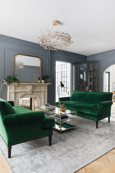 hunter green and gray living room