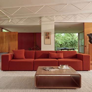 red modern sofa with three seats