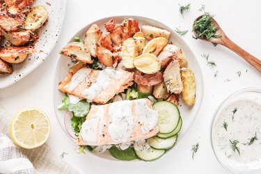 Baked salmon with crispy Parmesan Potatoes and Dill Dressing