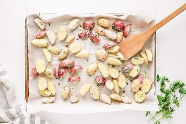 Parmesan potatoes on a baking sheet