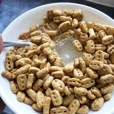 Bowl of cereal with ice cubes