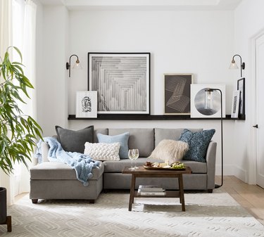 gray sofa in gray and blue living room