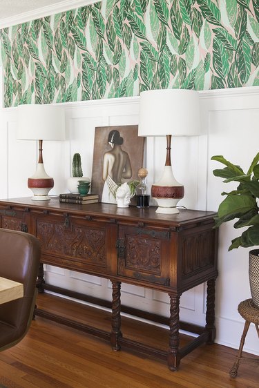 vintage and modern dining room with wood credenza