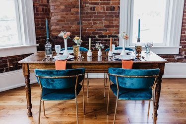 table with blue velvet chairs