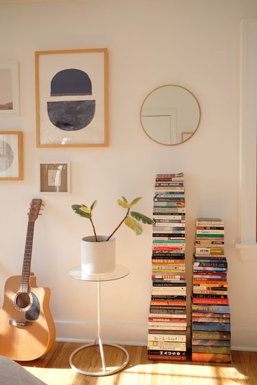 small bedroom storage idea: invisible vertical bookshelf