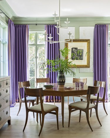 mint green walls and purple drapes