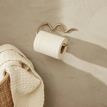 brass curved toilet paper holder
