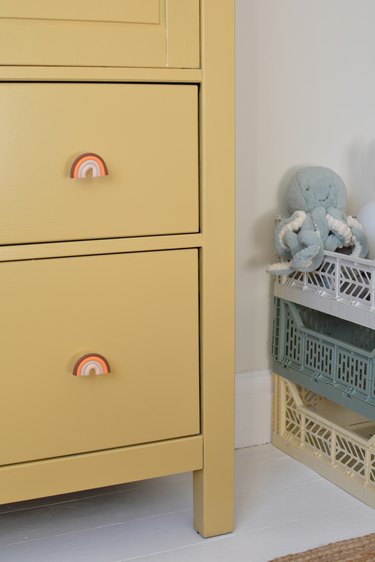 Rainbow door knobs on childs wardrobe