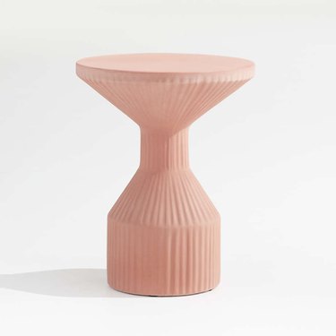 pink column-like garden stool