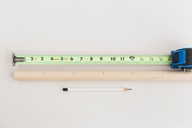 Measure and mark the dowel rod into 3-inch sections.